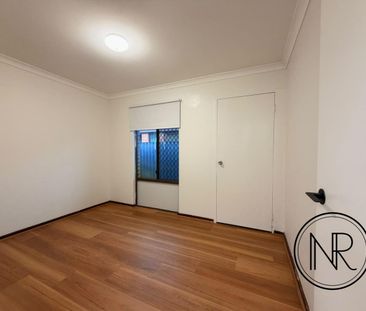 Large Family Home Within WSHS and Oberthur Primary School Zone! - Photo 3
