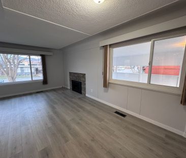 Central – 2 bed, 1 bath main floor suite - Photo 1