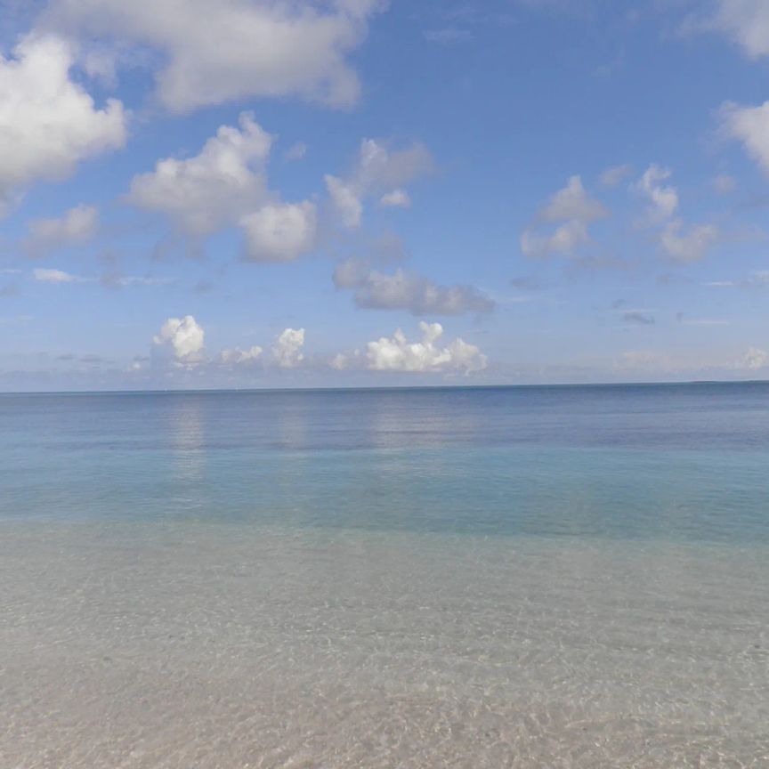 Ground-Level Gem with Sunny Alfresco, On the Beach! - Photo 1