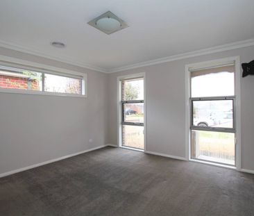 FAMILY HOME WITH THREE SEPARATE LIVING AREAS AND STUDY SPACE - Photo 1