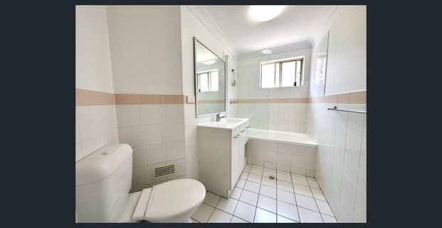 Refreshed 2 Bedroom Unit Close to Station! - Photo 1