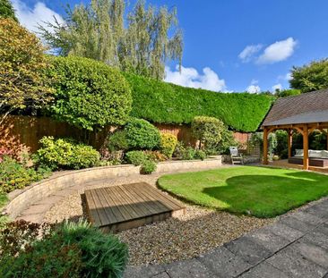 A beautifully refurbished three-bedroom detached home in the sought... - Photo 3