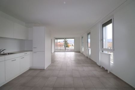 Nähe Dorfzentrum Reinach - moderne 2.5-Zimmer-Wohnung im DG - Photo 3