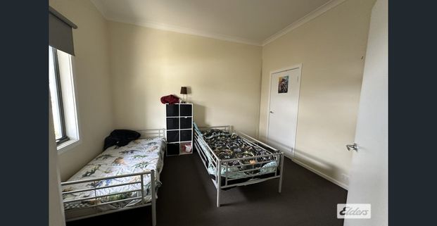 4 bedroom home on a large block - Photo 1