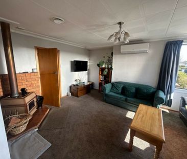 Tidy three bedroom home - Photo 1