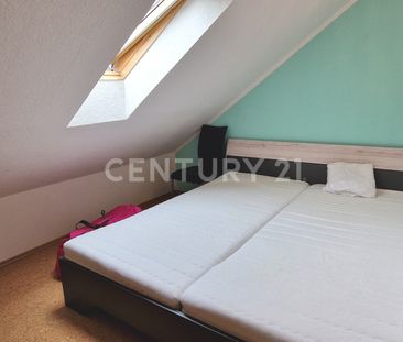 Gemütliche Dachgeschosswohnung mit Einbauküche - Photo 3