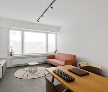 Gelijkvloers appartement met terras en tuin. - Foto 3