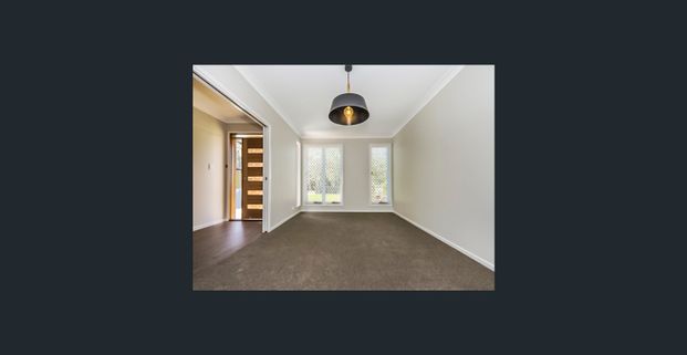 Large Family Home with Spacious Backyard! - Photo 1