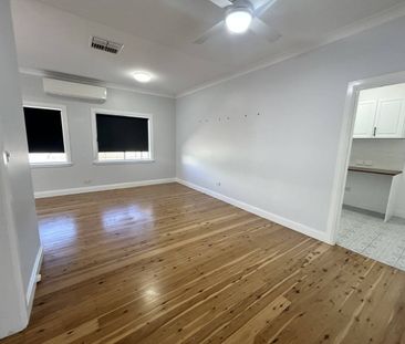 Spacious Family Home with Large Shed - Photo 5