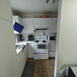 3 1/2 Anjou Calme Beaucoup De Rangements - Photo 2