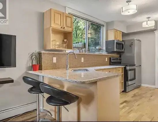 Cozy 1 bedroom downtown apartment | 2417 2 Street Southwest, Calgary - Photo 1