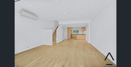Freshly Painted Large Open Plan Two Bedroom Townhouse - Photo 4