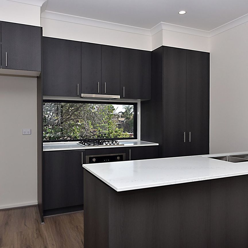 Modern Coastal Living Over Three Spacious Levels - Photo 1