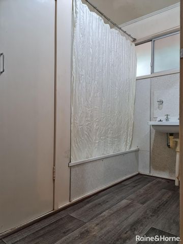 THREE BEDROOM HOME WITH AC THROUGHOUT AND DOUBLE BAY SHED - Photo 5