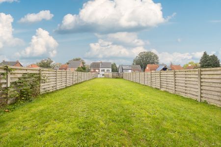 Appartement op de 1ste verdieping met garage en tuin - Photo 2