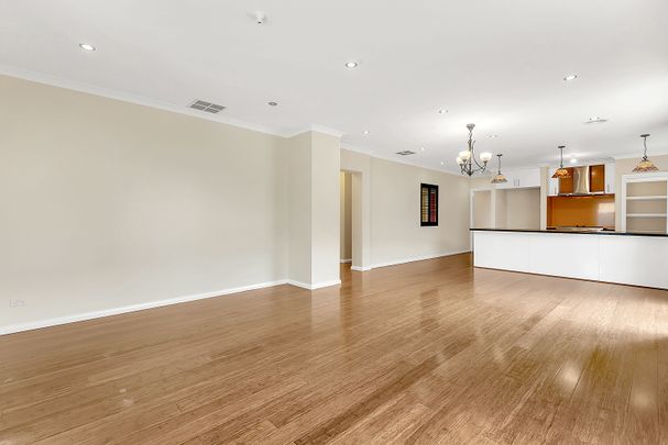 This lovely home is situated in a prime location, close to public transport - Photo 1