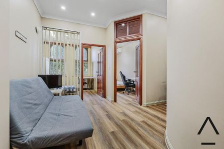 Furnished 2-Bedroom Apartment in the Heart of Newtown - Photo 2