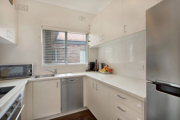 A Private Top Floor Setting With Sweeping Park Views - Photo 1