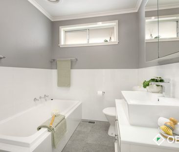 Spacious 3-Bedroom Home with Modern Updates & Double Garage - Photo 5