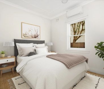 Air-Conditioned 2--3 bedroom Residence In Great Location - Photo 2