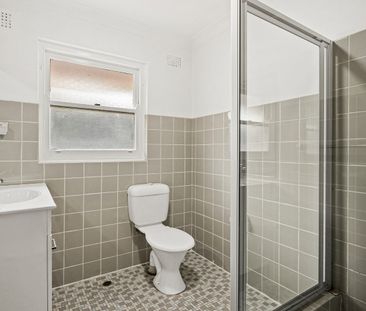 Peaceful living in leafy Mount Keira - Photo 5