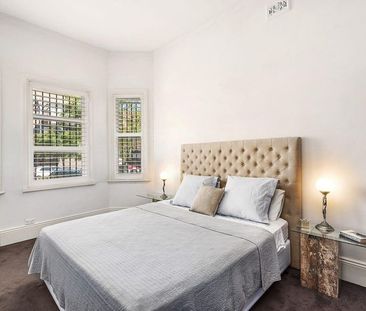 Elegant, Light-Filled Semi with Parking in Prime Inner-City Locale - Photo 6