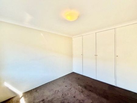 Beautifully Renovated Two-Bedroom Unit! - Photo 2