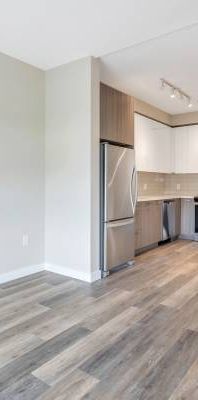 2 Bed + 2 Bath + Den available @ River District! - Photo 1