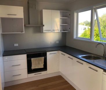 Inviting 3-Bedroom Family Home with Covered deck - Photo 6