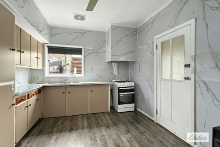 THREE-BEDROOM HOME WITH GARAGE - Photo 3