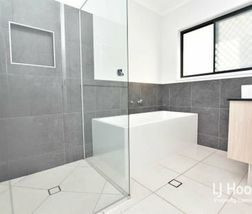 MODERN FAMILY HOME WITH MULTIPLE LIVING AREAS! - Photo 2