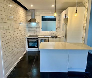 Sunny, Warm, Secure, Renovated unit - Photo 2