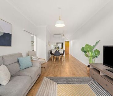 Sun-Filled, Renovated Apartment Just Steps from the Bay - Photo 1