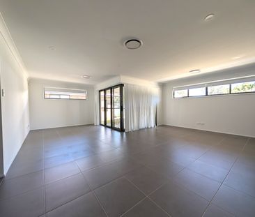 Modern 4-Bedroom Home in a Convenient Gorokan Location - Photo 2