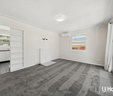 Spacious Three-Bedroom Home - Photo 6