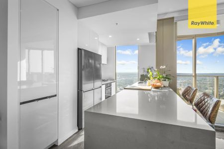 LUXURIOUS THREE BEDROOM SKY-HIGH LIVING WITH WRAPAROUND VIEWS - Photo 2