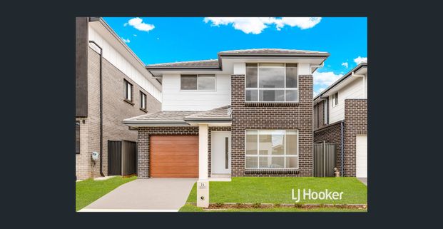 Beautiful 4 Bedroom Home - Available Now! - Photo 1