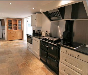 Nestled in the sought-after village of West Ashling, just north-wes... - Photo 2