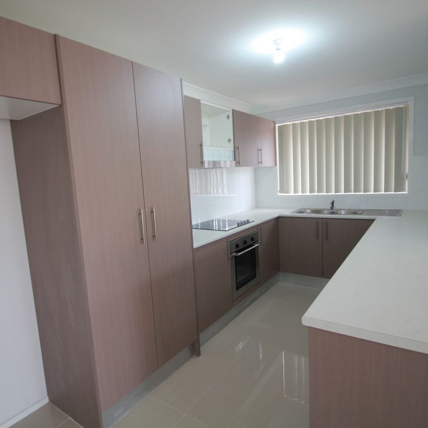 STUNNING NEAR NEW BRICK VENEER HOUSE - Photo 1