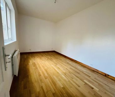 A LOUER APPARTEMENT EN RDC PROCHE CENTRE VILLE DE ST QUENTIN 02100 - Photo 1