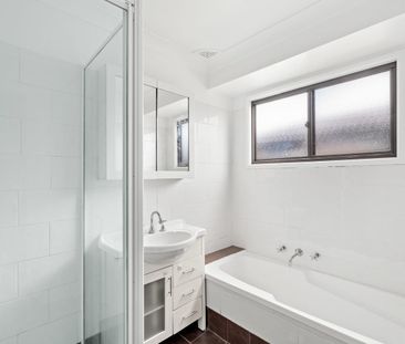 Spacious 3-Bedroom Home with Large Yard & New Kitchen - Photo 6