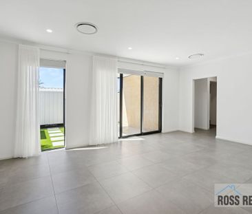 Sleek & Modern 3×2 Home with Secure Double Garage - Photo 1