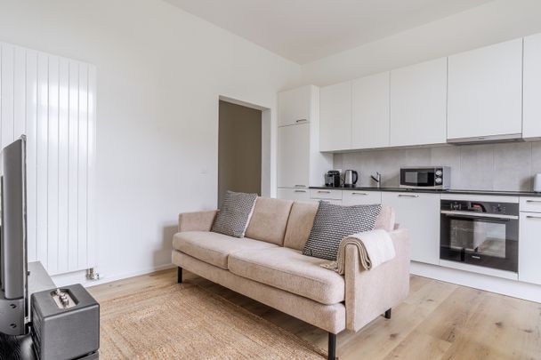 Toprenovierte Terrassenwohnung! - Foto 1