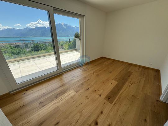 APPARTEMENT DE 2,5 PIÈCES EN ATTIQUE AVEC VUE PANORAMIQUE SUR LE LAC - Photo 1