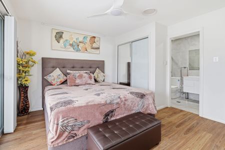 PARK FACING FOUR-BEDROOM HOME | MULTIPLE LIVING AREAS + SOLAR - Photo 5