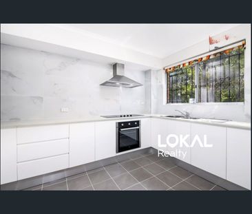 Full Brick Corner Townhouse in Prime & Convenient Location - Photo 3