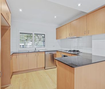 Freshly Painted Large Open Plan Two Bedroom Townhouse - Photo 4