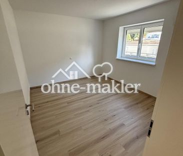 Erstbezug: Tolle 3-Zimmer Wohnungen in energieeffizientem KFW55 Haus - Photo 3