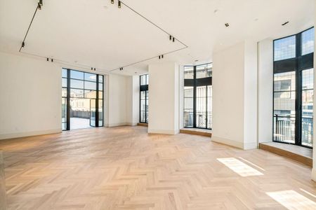 An exceptional second-floor interior designed 3 bedroom apartment in the prestigious The Whiteley development, W2 - Photo 5
