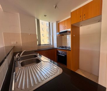 PRIVATE COURTYARD LIVING WITH VIEWS IN THE HEART OF HURSTVILLE - Photo 6